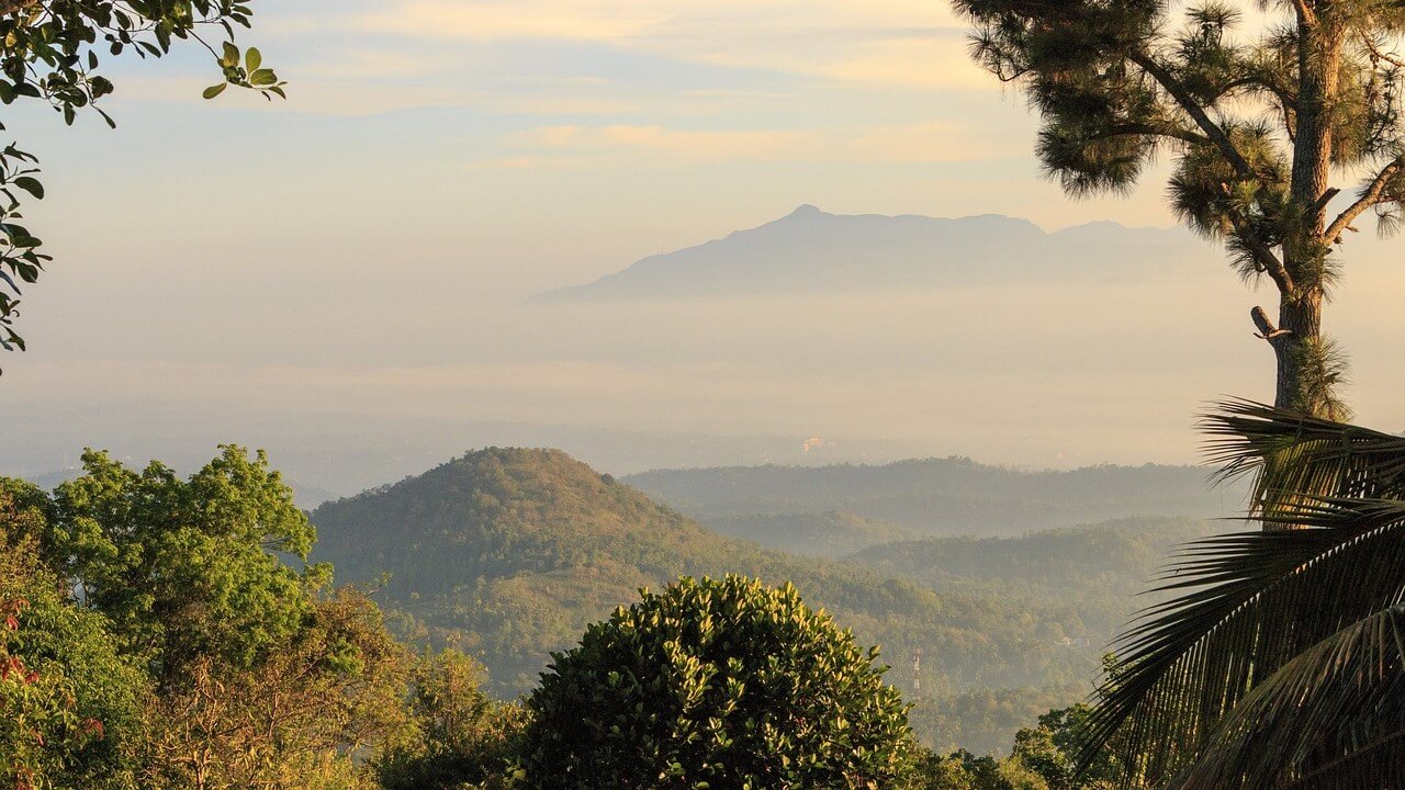 A panoramic view of Knuckles mountain range with early morning mist
